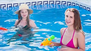 Kinky chicks having fun in the pool - Reddish Parasol & Kate Quinn
