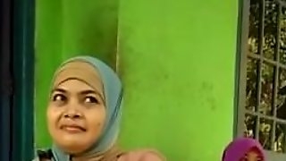 Beautiful Indonesian mom in hijab